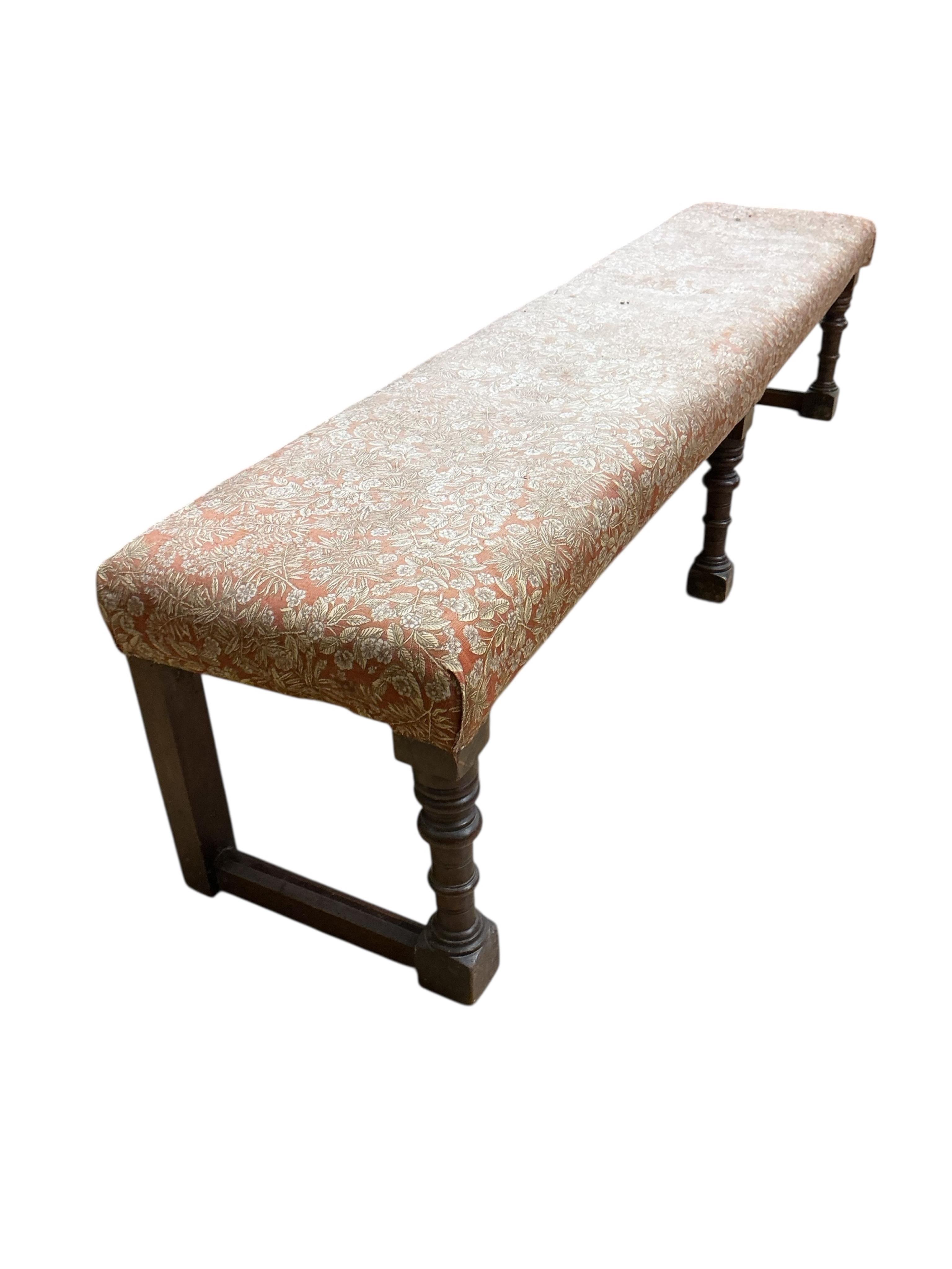 A late Victorian turned mahogany bench, adapted, width 200cm, depth 46cm, height 46cm